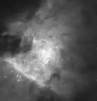 Description de l'image par IA : Nébuleuse d'Orion avec des nuages de gaz et étoiles brillantes.